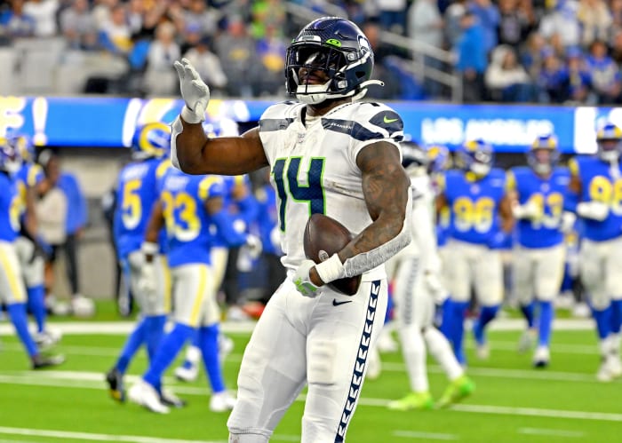 Seattle Seahawks wide receiver DK Metcalf (14) celebrates after a touchdown in the fourth quarter against the Los Angeles Rams at SoFi Stadium.